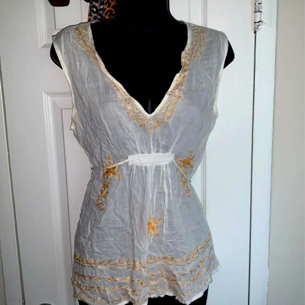 Sheer sleeveless top with ties